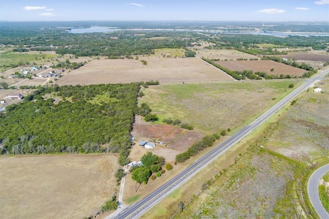 birds eye view of property featuring a rural view