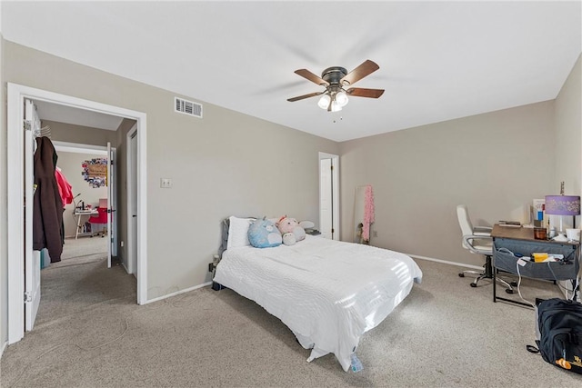 bedroom featuring ceiling fan and light colored carpet