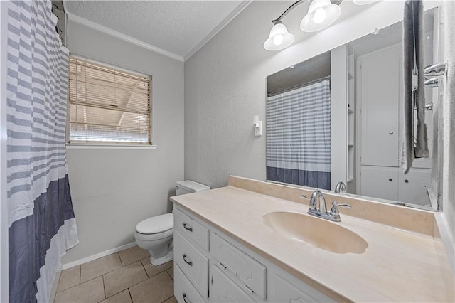 bathroom with vanity, tile patterned floors, toilet, ornamental molding, and a textured ceiling