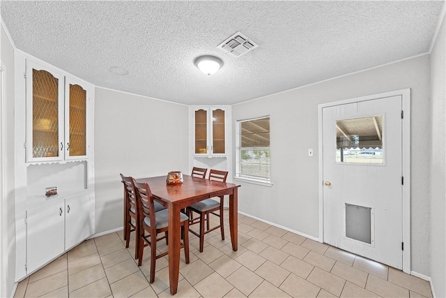 dining area with a textured ceiling