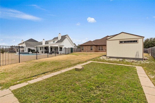 view of patio featuring a fire pit, area for grilling, and fence