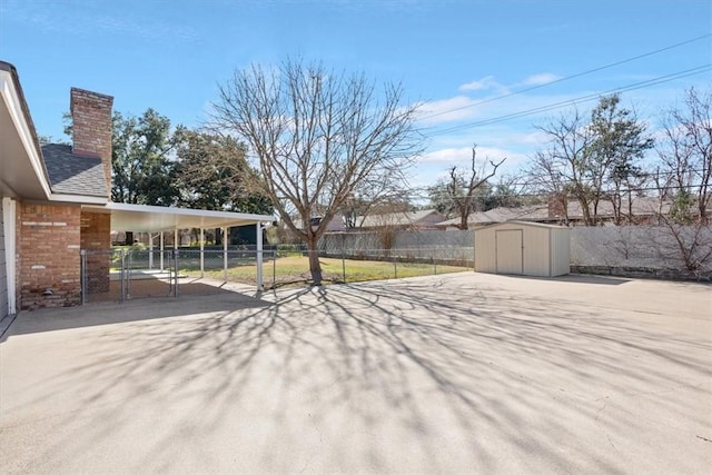 view of yard with a patio area and a shed