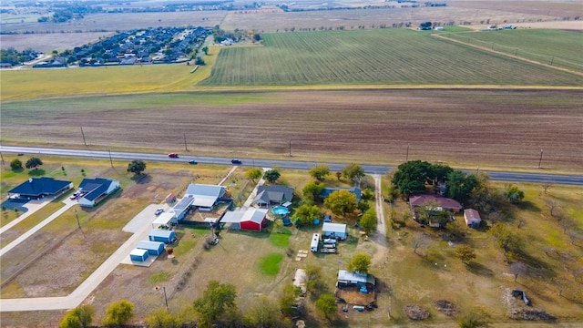 birds eye view of property featuring a rural view