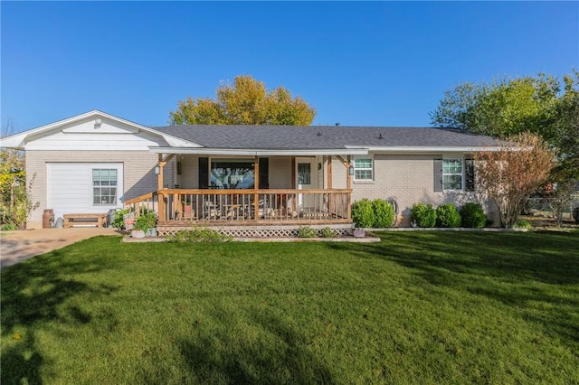 view of front of property with covered porch and a front yard