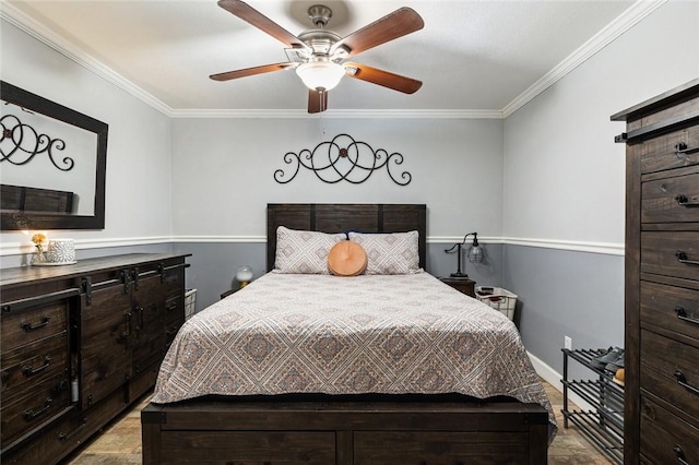 bedroom featuring ceiling fan and crown molding