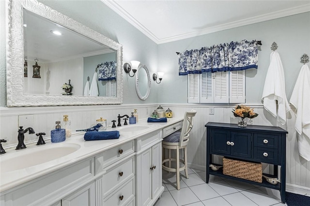 bathroom featuring tile patterned floors, vanity, and ornamental molding