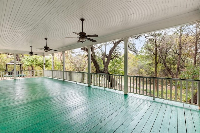 wooden deck with ceiling fan