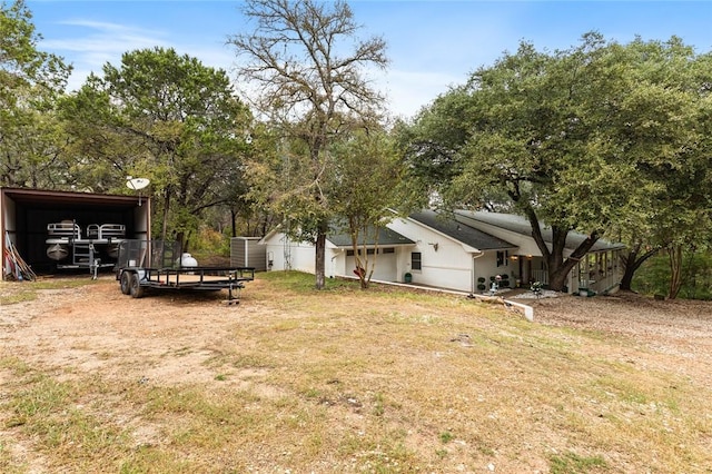 view of yard with a carport