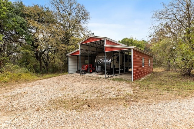 view of outdoor structure featuring a carport