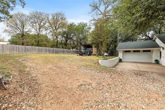 view of yard with a garage