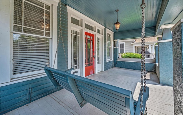 wooden deck with a porch