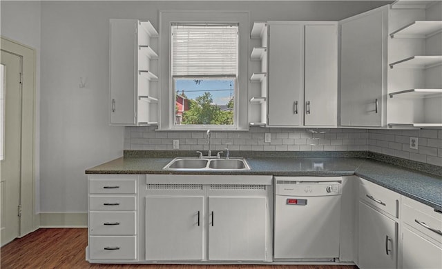 kitchen with white cabinetry, dishwasher, sink, tasteful backsplash, and dark hardwood / wood-style floors