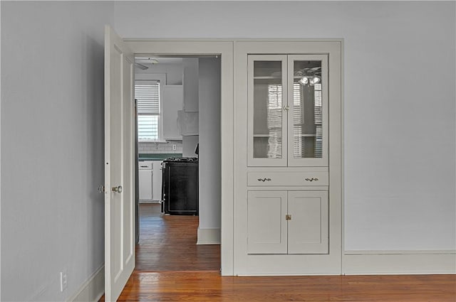 hall featuring dark hardwood / wood-style flooring