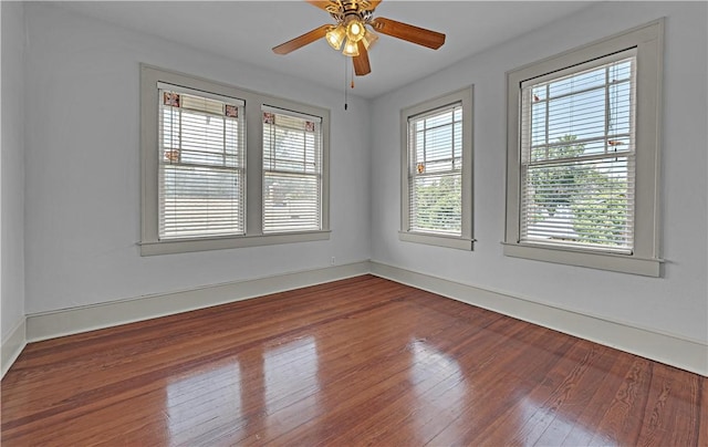 unfurnished room featuring ceiling fan and wood-type flooring