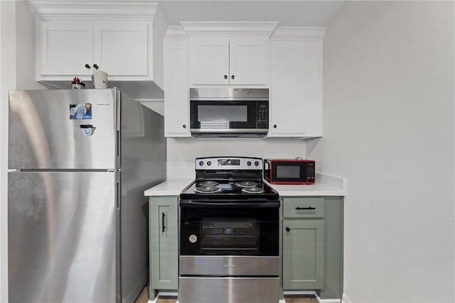 kitchen featuring white cabinets and stainless steel appliances