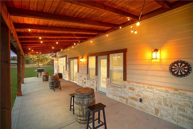 view of patio featuring a grill