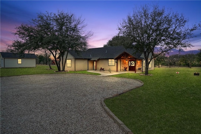 view of front of home with a lawn