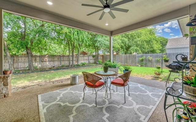 view of patio featuring ceiling fan