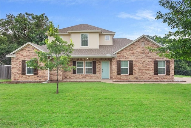 view of front facade with a front yard