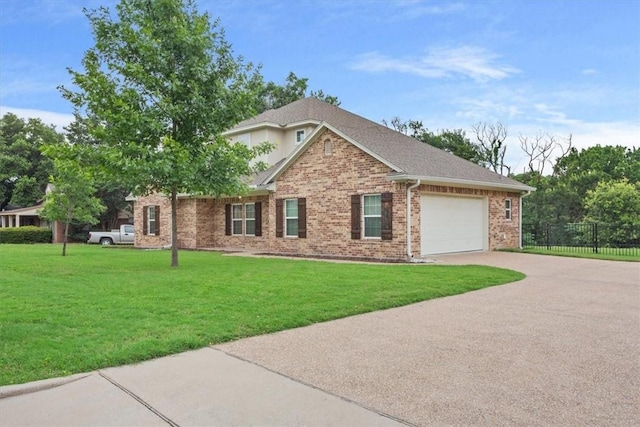 view of front facade featuring a garage and a front yard