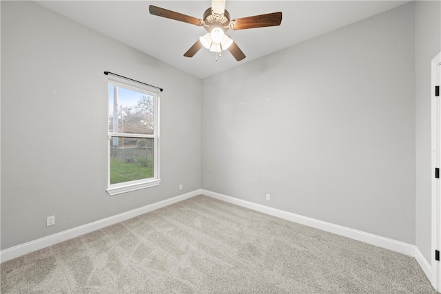 carpeted empty room with ceiling fan