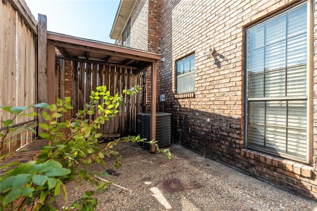 view of property exterior featuring central AC