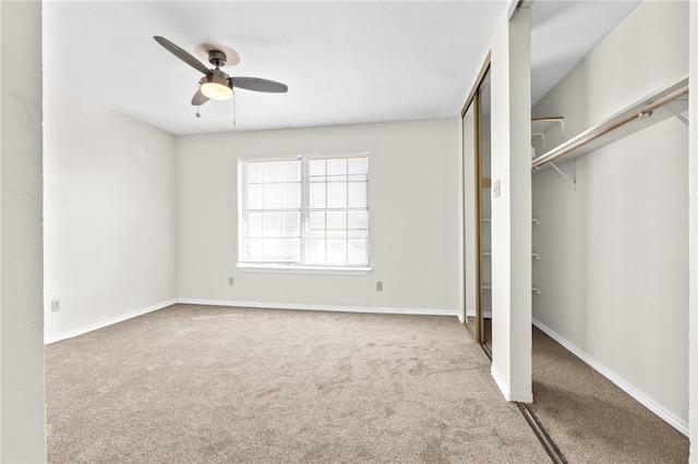 unfurnished bedroom with carpet flooring and ceiling fan