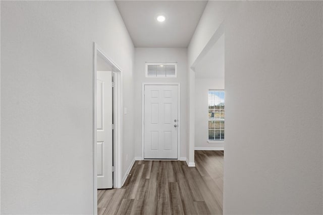 hallway featuring light wood-type flooring