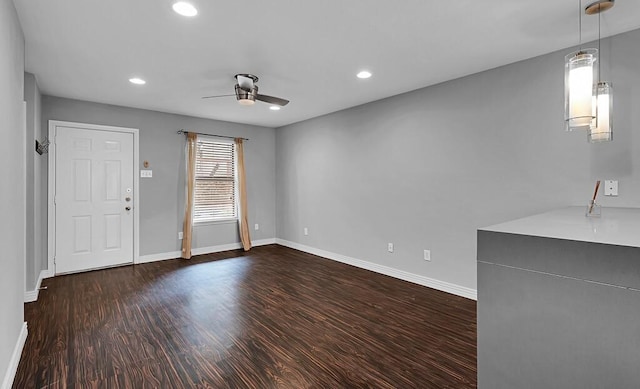 unfurnished room featuring recessed lighting, baseboards, ceiling fan, and wood finished floors