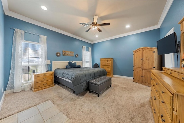 carpeted bedroom with ceiling fan and crown molding