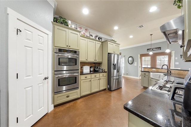 kitchen with pendant lighting, crown molding, kitchen peninsula, stainless steel appliances, and extractor fan