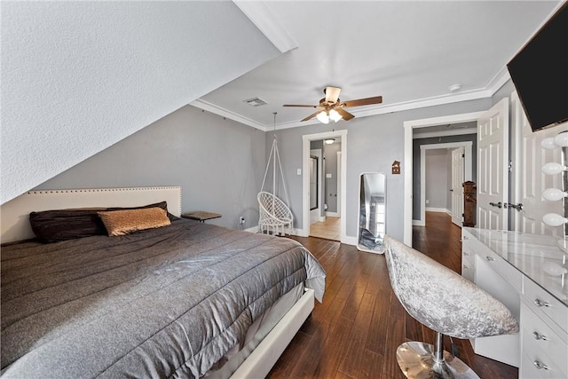 bedroom featuring ceiling fan, dark hardwood / wood-style flooring, and crown molding