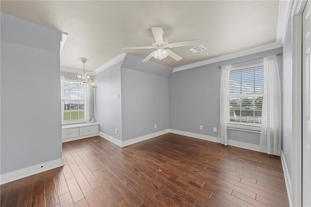 empty room featuring ceiling fan with notable chandelier, ornamental molding, and dark wood-type flooring