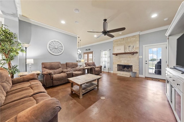 living room with a fireplace, ceiling fan, and ornamental molding