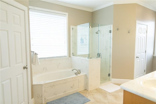 bathroom featuring a garden tub, vanity, a marble finish shower, tile patterned floors, and crown molding