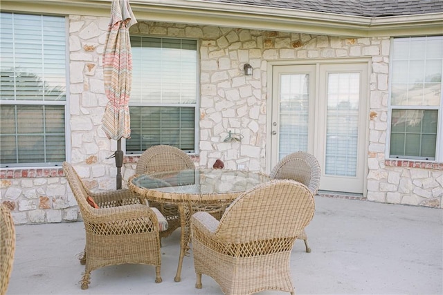 view of patio featuring outdoor dining area