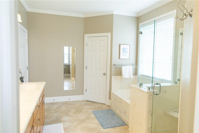 bathroom featuring a bath, a wealth of natural light, vanity, and crown molding