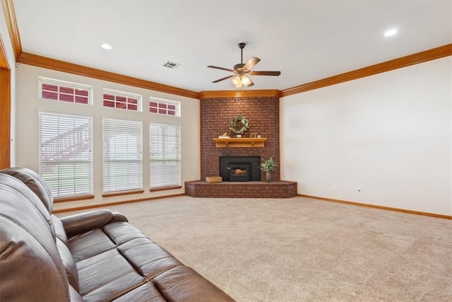 living room with crown molding, carpet floors, and ceiling fan