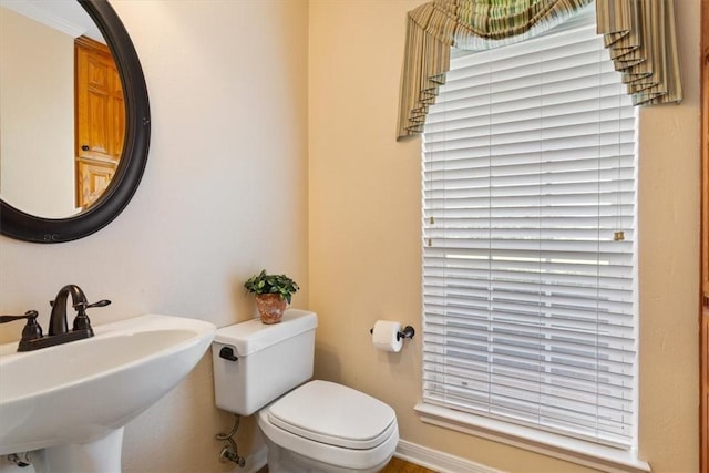 bathroom with sink and toilet