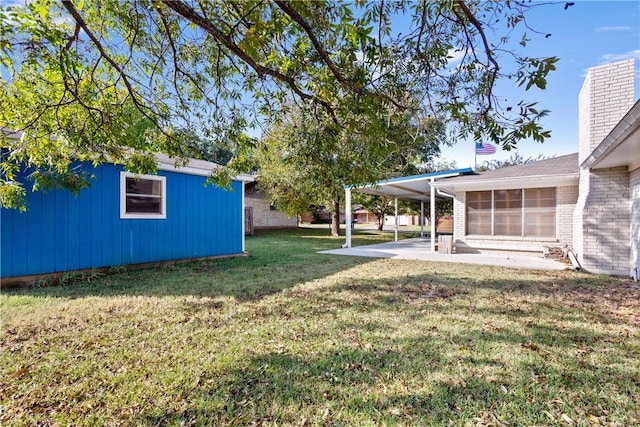 view of yard featuring a patio