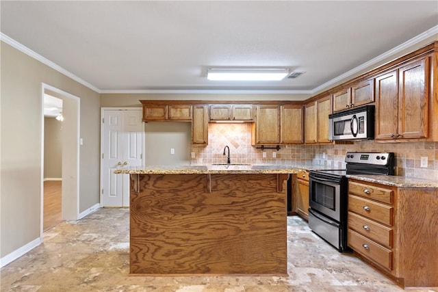 kitchen with tasteful backsplash, light stone counters, stainless steel appliances, and ornamental molding