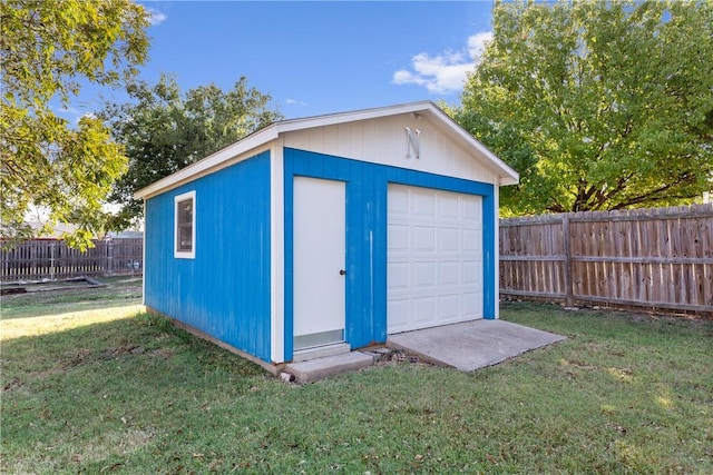 view of outbuilding with a lawn