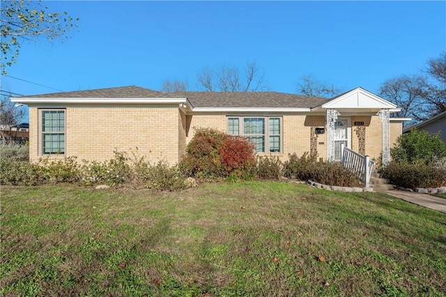 ranch-style house with a front yard