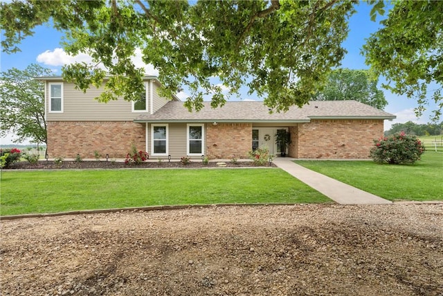 view of front facade with a front yard