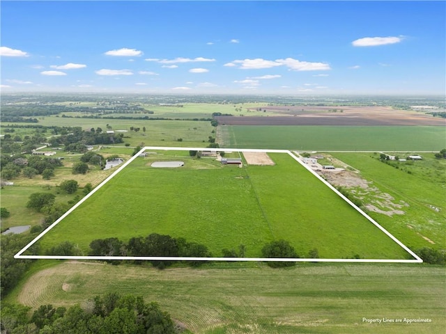 birds eye view of property featuring a rural view