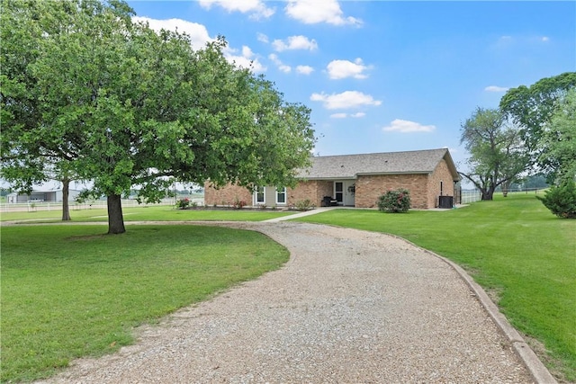 single story home with a front yard