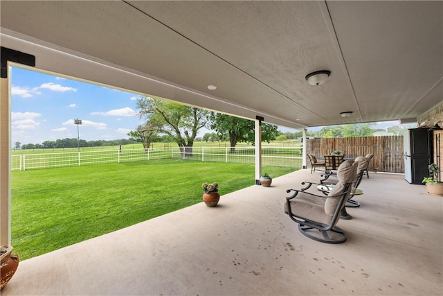 view of patio / terrace with a rural view