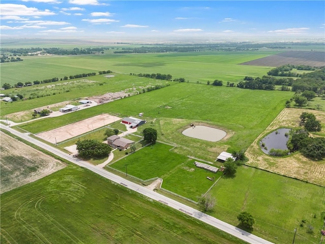 bird's eye view featuring a rural view and a water view