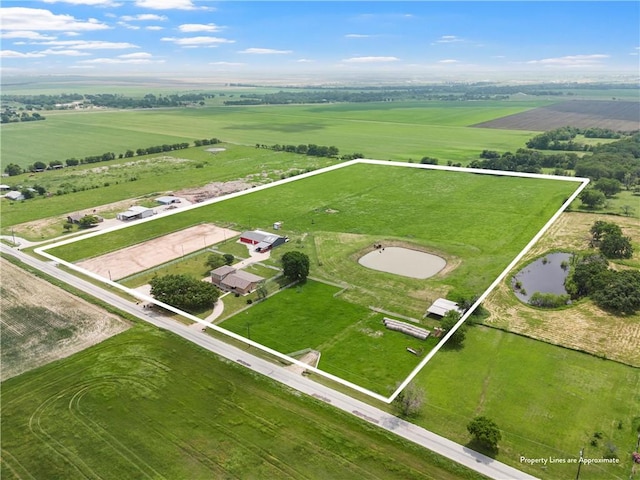 aerial view featuring a water view and a rural view