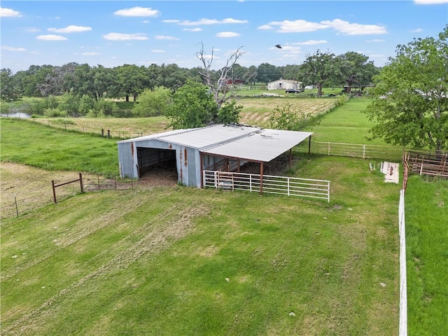 view of outdoor structure featuring a rural view